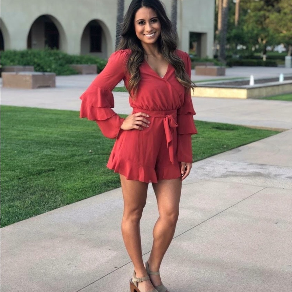 RED FLARED ROMPER- long sleeve tie side